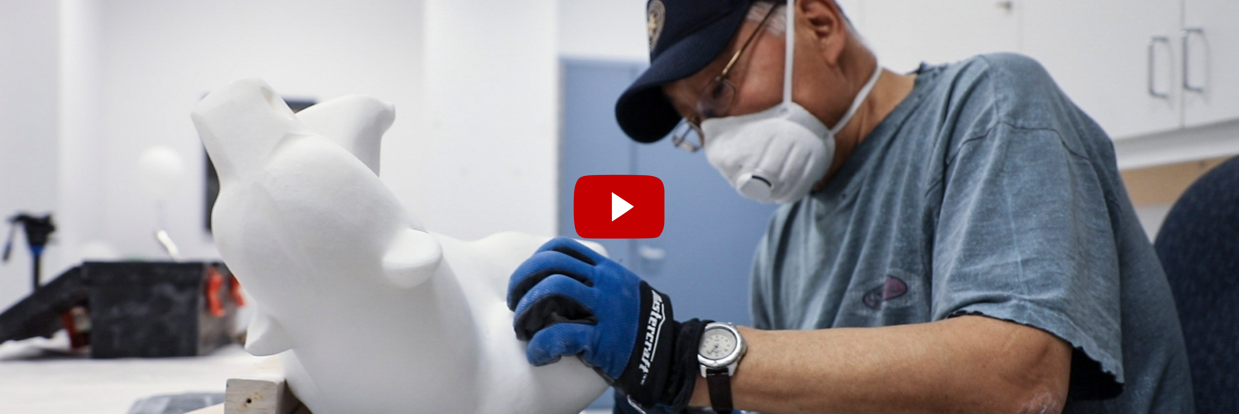 Saila Kipanek carves a piece of stone